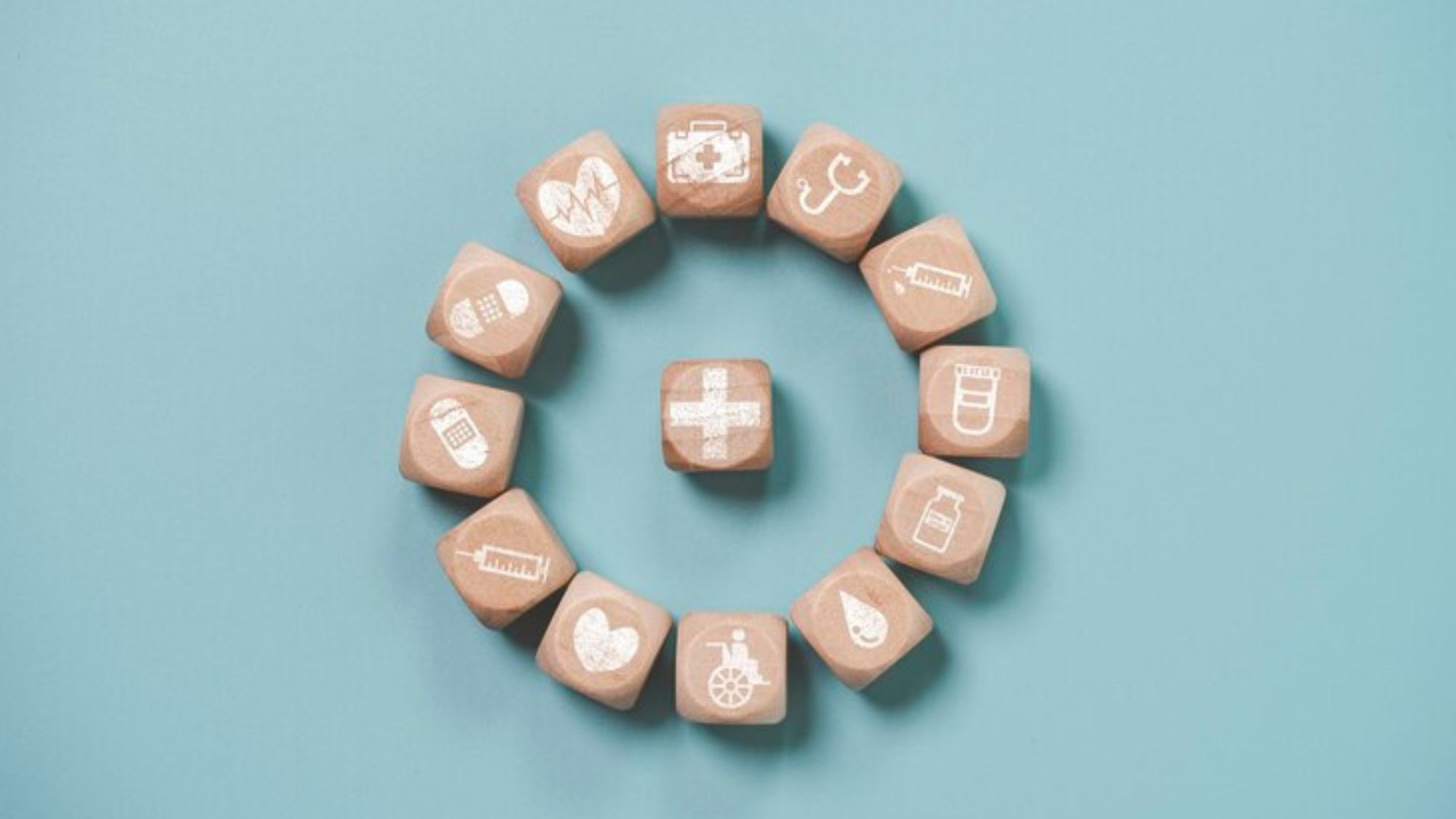 Wooden blocks showcasing healthcare & medical employees excellence on a blue background